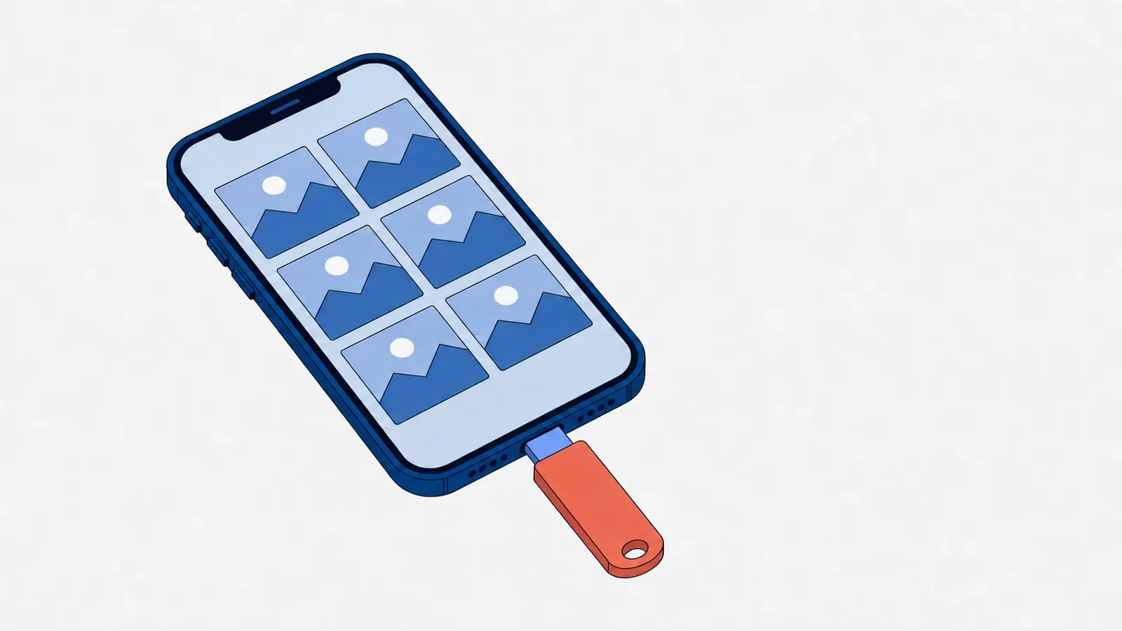 Smartfon leżący ekranem do góry, z siatką sześciu zdjęć na ekranie, z koralowym pendrive'em z wtykiem USB-C włożonym prosto w gniazdo ładowania
